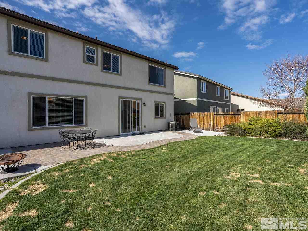 2055 Peaceful Valley Drive Reno, NV 89521 - Photo 24 of 26 a view of a house with backyard and sitting area