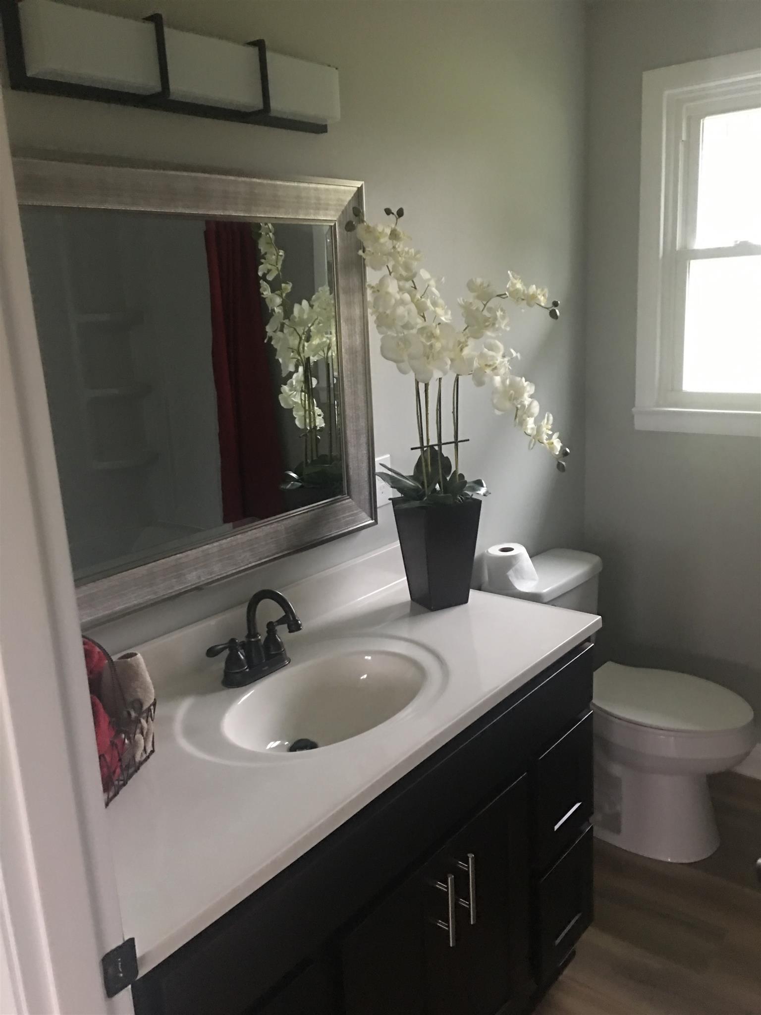 825 East Campbell Road Madison, TN 37115 - Photo 12 of 20 Brand NEW Master Bath with Tub/shower combination and Laminate Flooring
