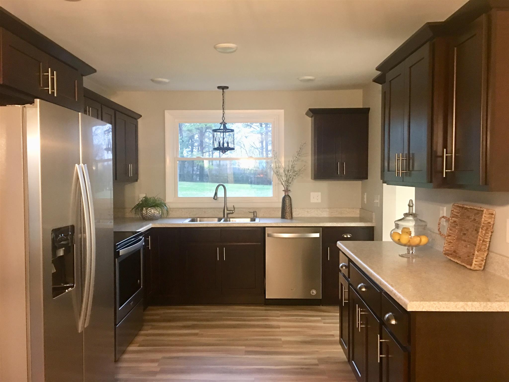825 East Campbell Road Madison, TN 37115 - Photo 7 of 20 NEW Custom cabinetry, Stainless sink and SS appliances You have a beautiful view of the spacious back yard from your kitchen window!