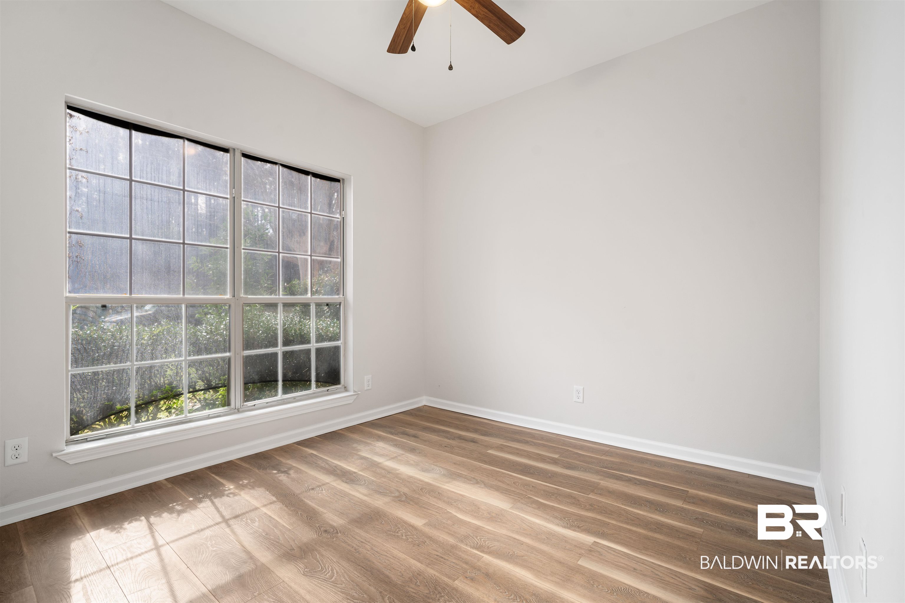 250 North Spring Lake Drive Mobile, AL 36695 - Photo 22 of 29 Front bedroom new sheetrock, smooth ceiling and ceiling fan.