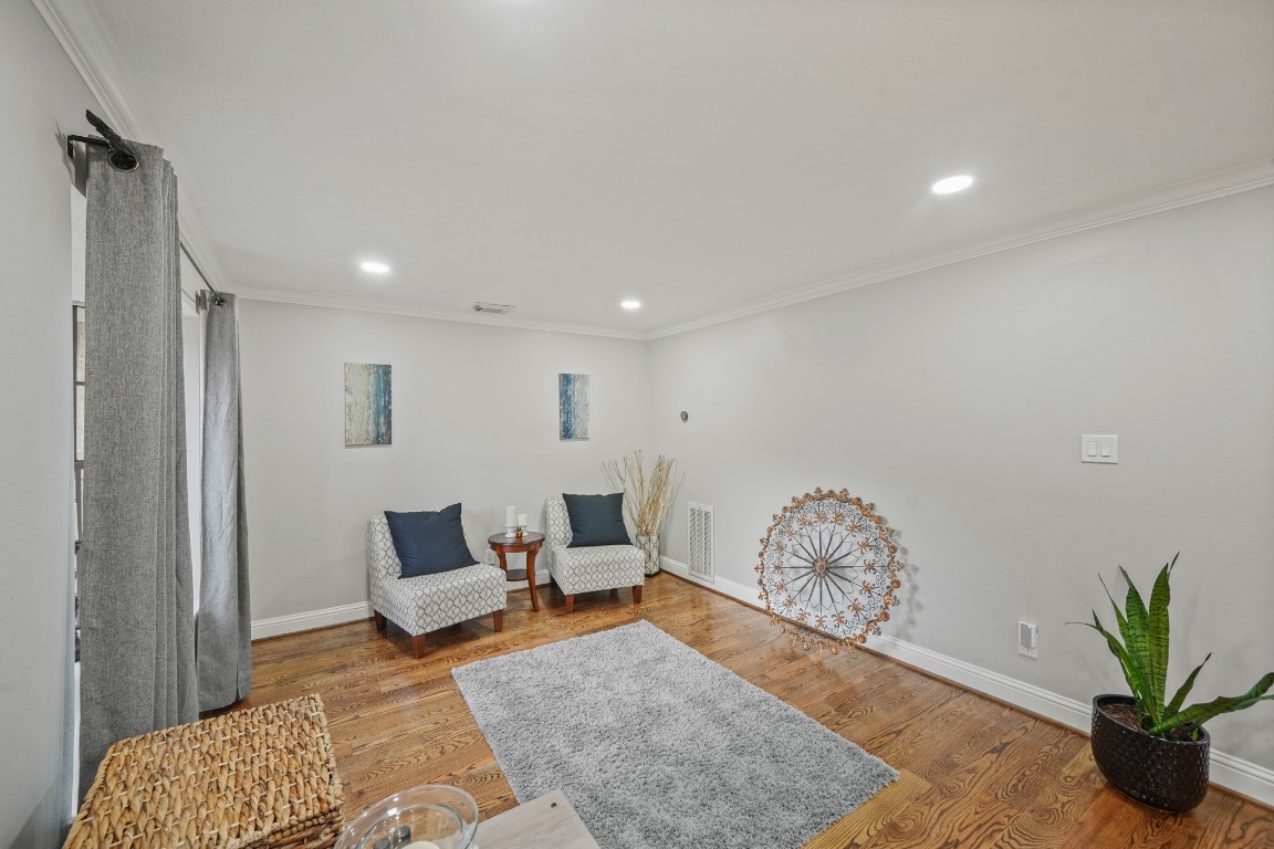15831 Ridge Park Drive Houston, TX 77095 - Photo 14 of 26 Bright and inviting room with hardwood floors and recessed lighting. Perfect for relaxation or entertaining.