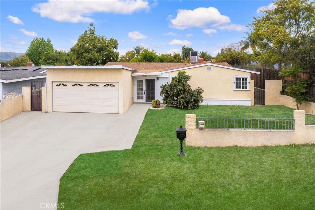 a view of a back yard of the house