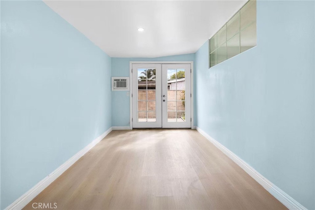 511 Dalesford Drive La Puente, CA 91744 - Photo 26 of 37 a view of an empty room with window and wooden floor
