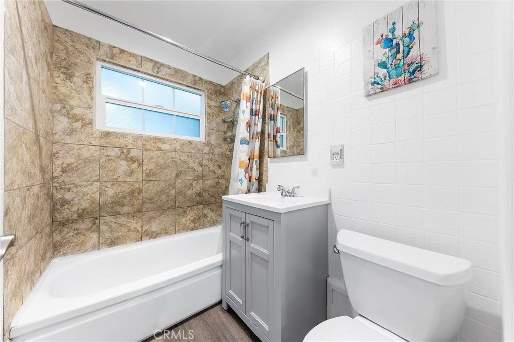 511 Dalesford Drive La Puente, CA 91744 - Photo 29 of 37 a bathroom with a toilet a sink and bathtub