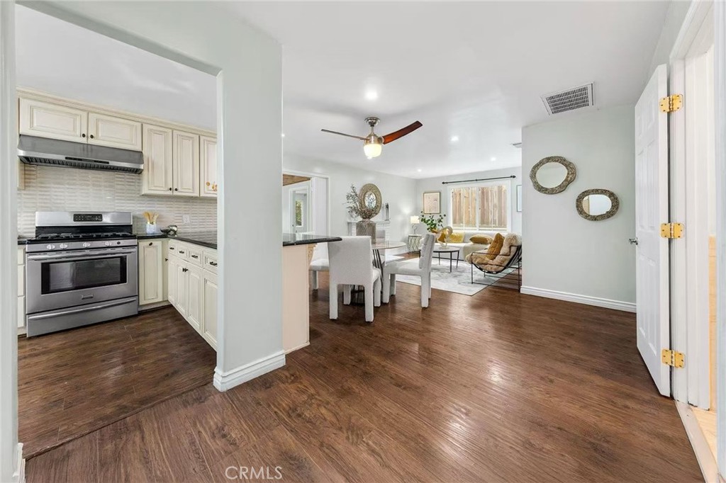 511 Dalesford Drive La Puente, CA 91744 - Photo 5 of 37 a view of a kitchen with furniture and wooden floor