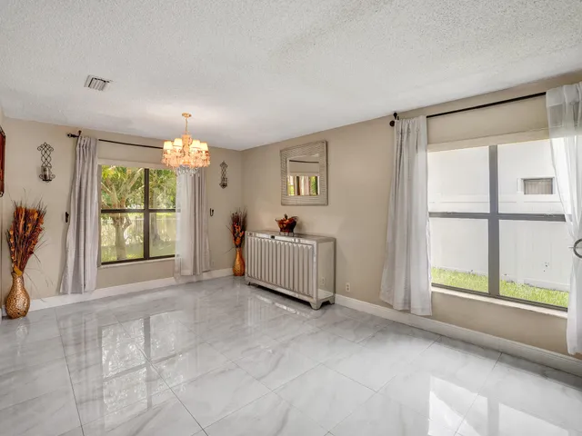 a view of a livingroom with furniture and a living room