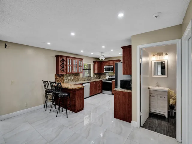 a view of storage and utility room with washer and dryer