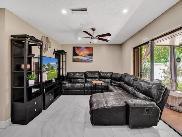 a bed room with a bed and a television