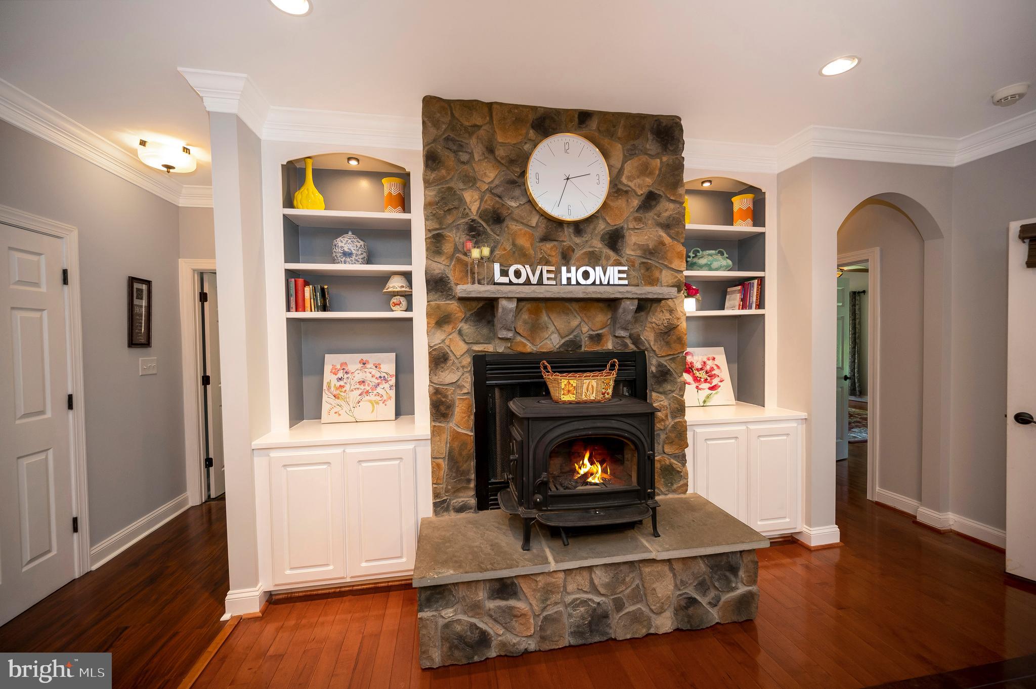 28229 Beech Drive Rhoadesville, VA 22542 - Photo 15 of 62 a living room with furniture and a fireplace