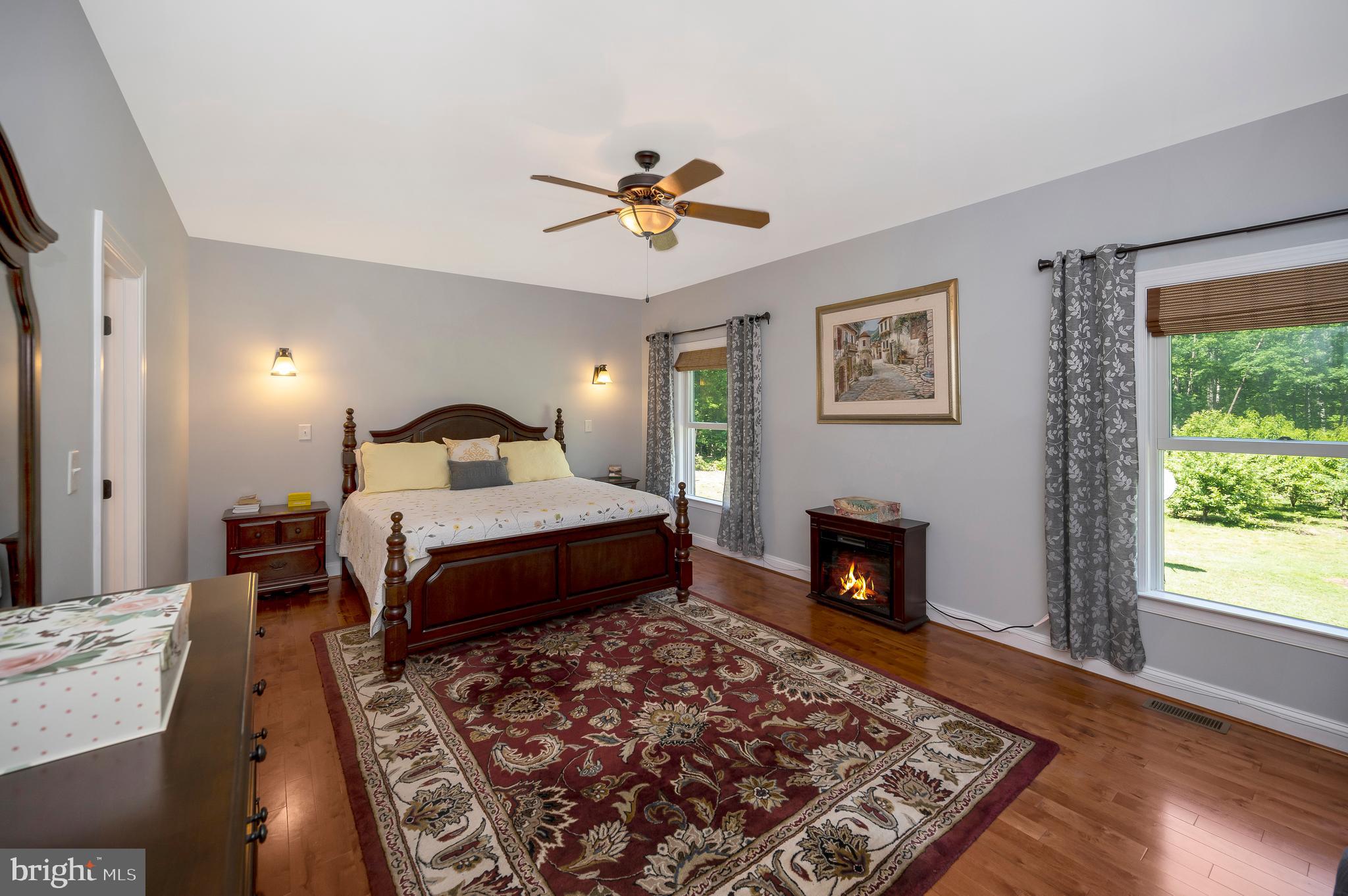 28229 Beech Drive Rhoadesville, VA 22542 - Photo 24 of 62 a bedroom with a bed and a fireplace