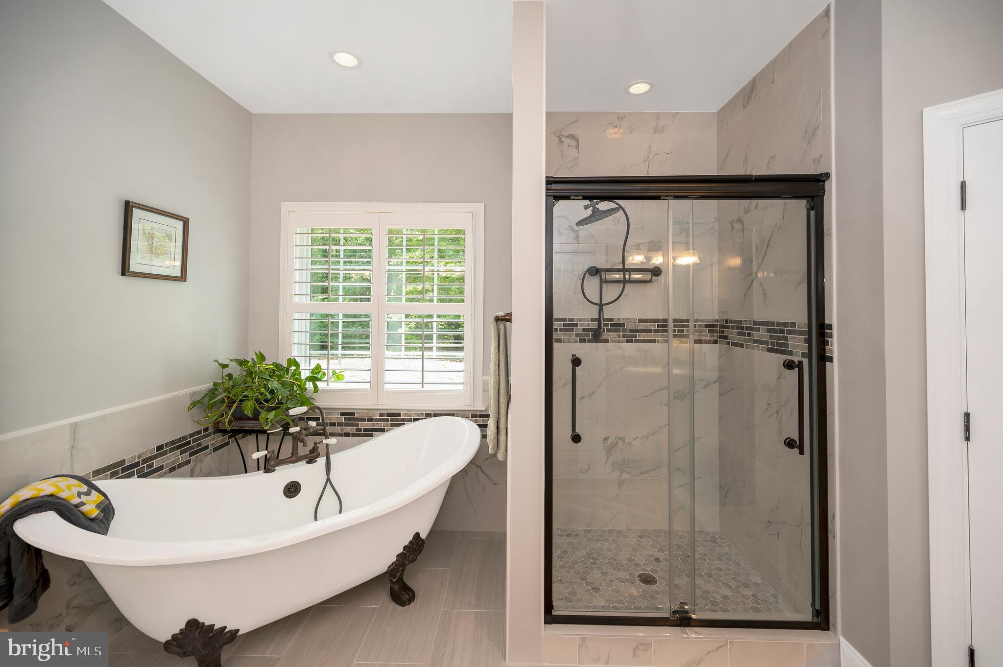 28229 Beech Drive Rhoadesville, VA 22542 - Photo 26 of 62 a bathroom with a tub and shower