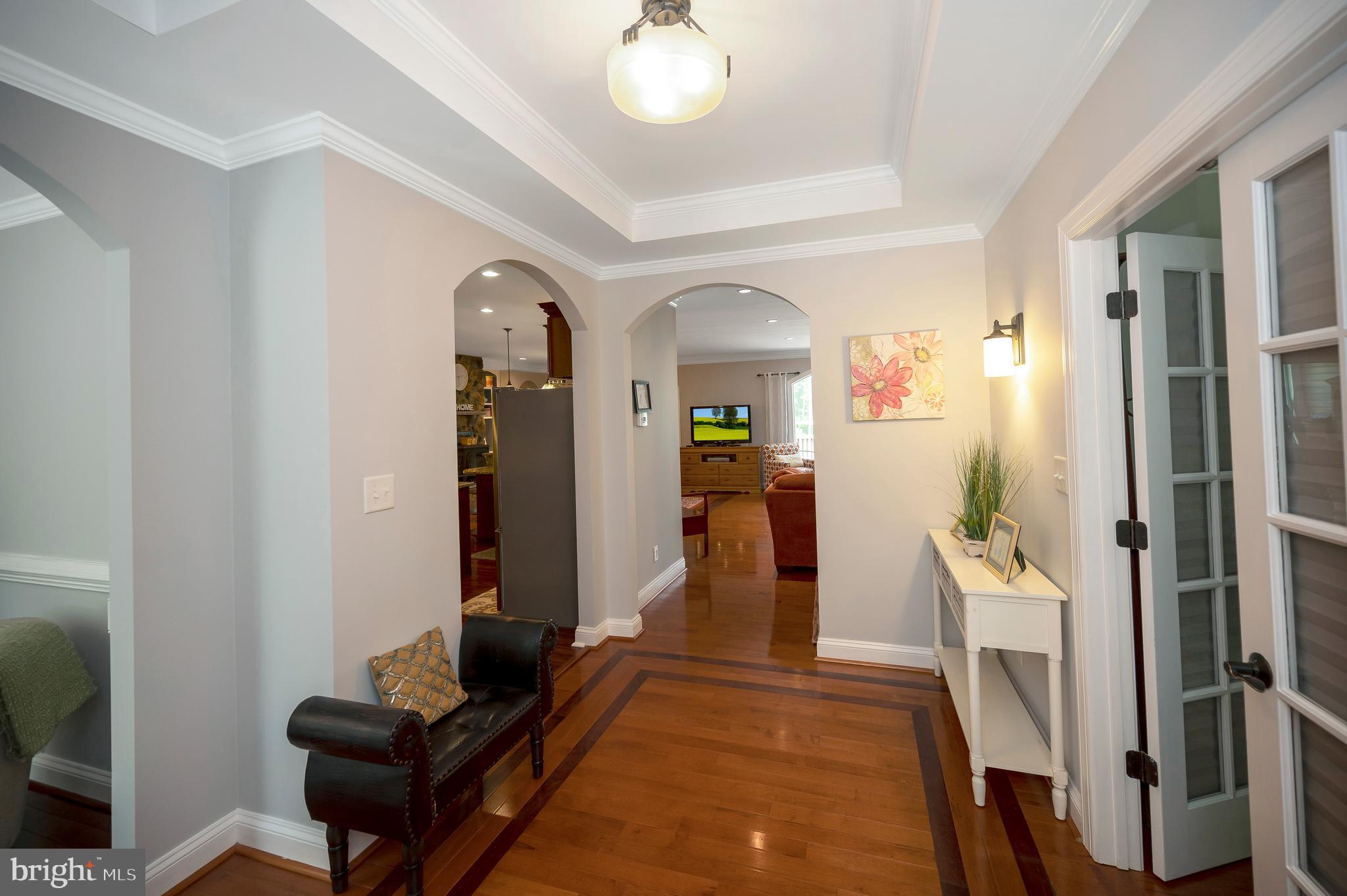28229 Beech Drive Rhoadesville, VA 22542 - Photo 3 of 62 a living room with furniture and a mirror