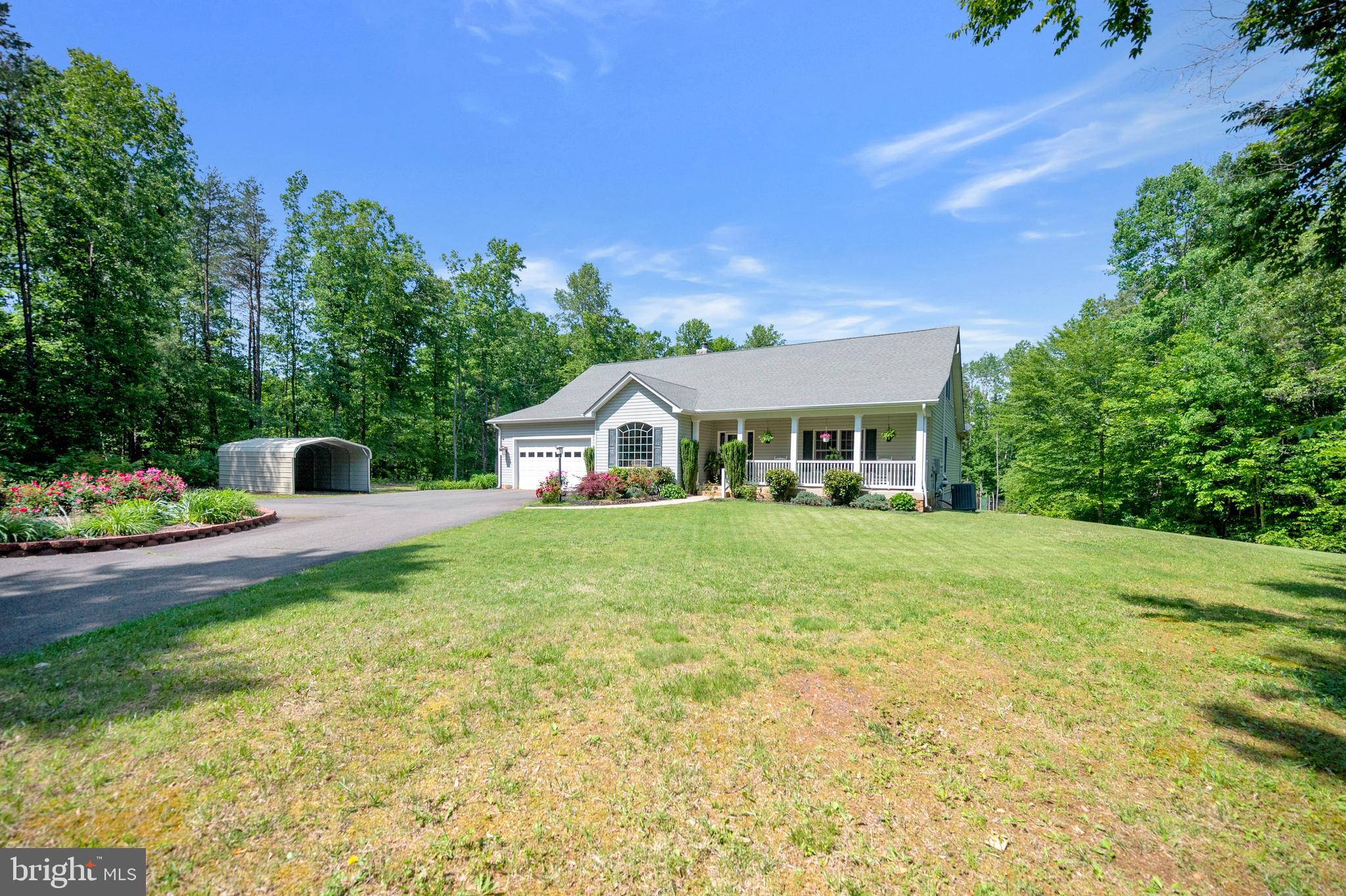 28229 Beech Drive Rhoadesville, VA 22542 - Photo 47 of 62 a front view of a house with a yard