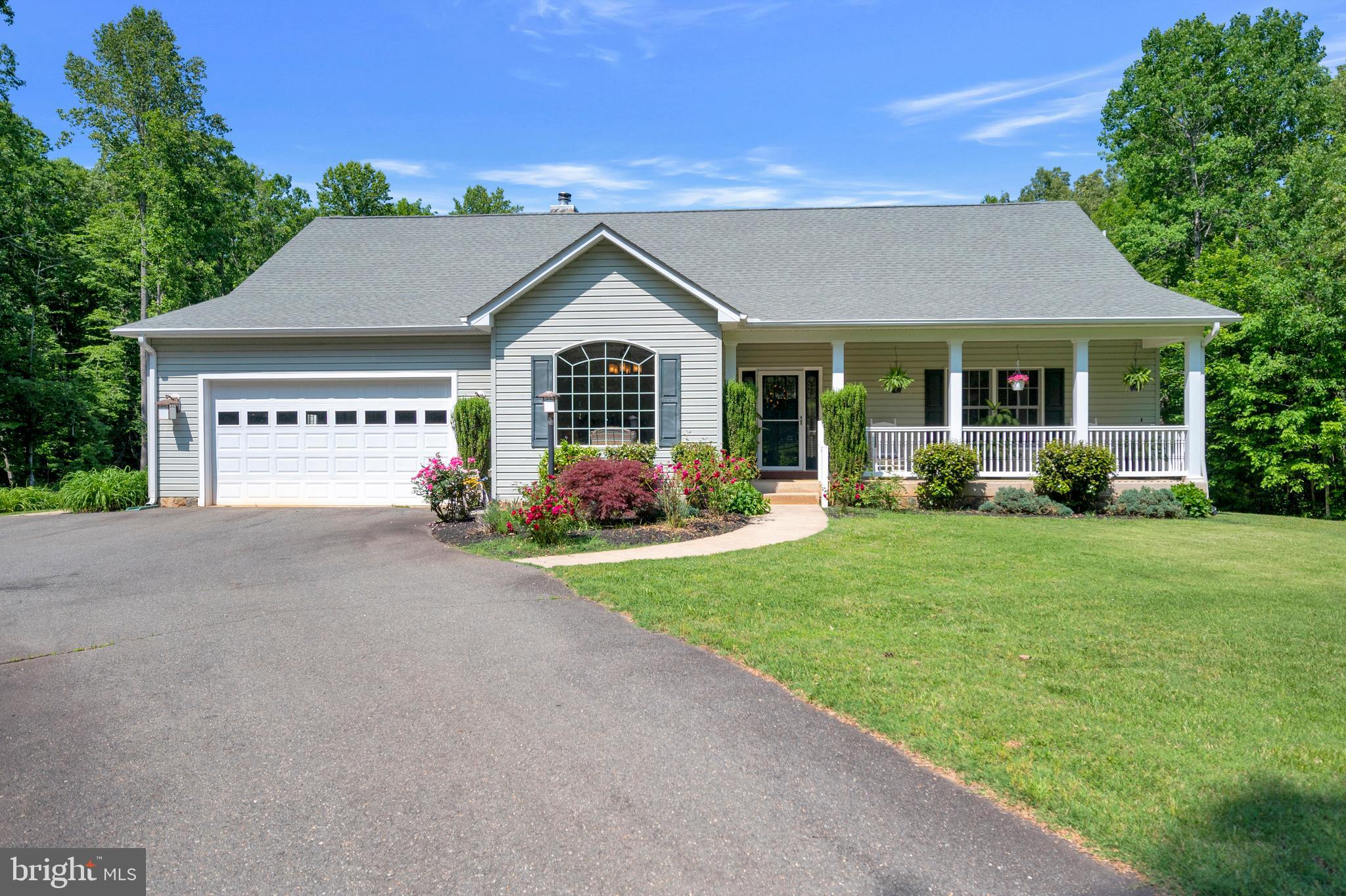 28229 Beech Drive Rhoadesville, VA 22542 - Photo 49 of 62 front view of a house with a yard