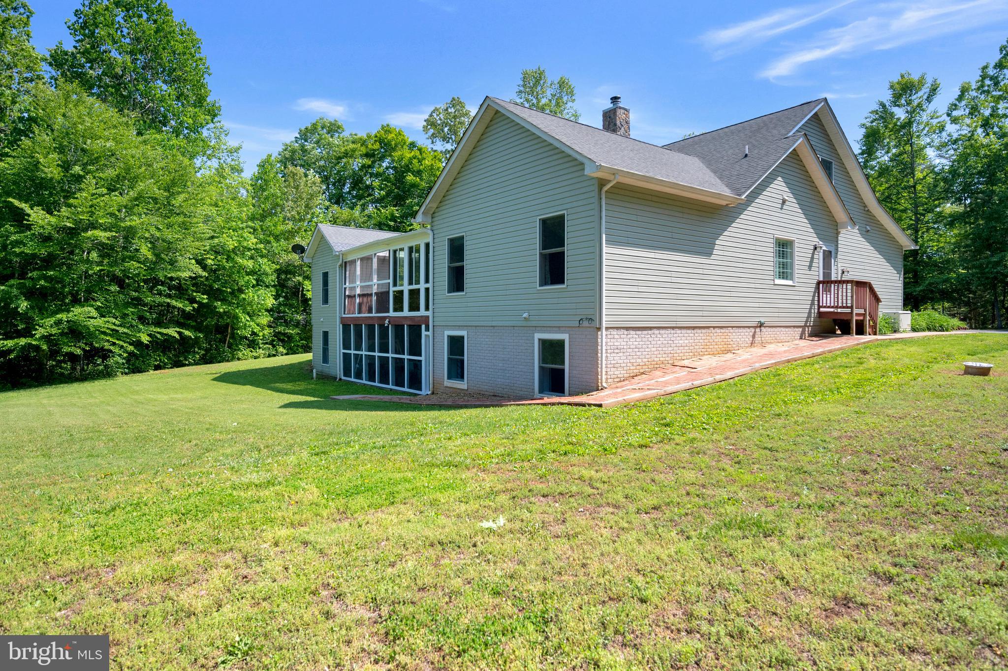 28229 Beech Drive Rhoadesville, VA 22542 - Photo 55 of 62 a view of a house with backyard and garden