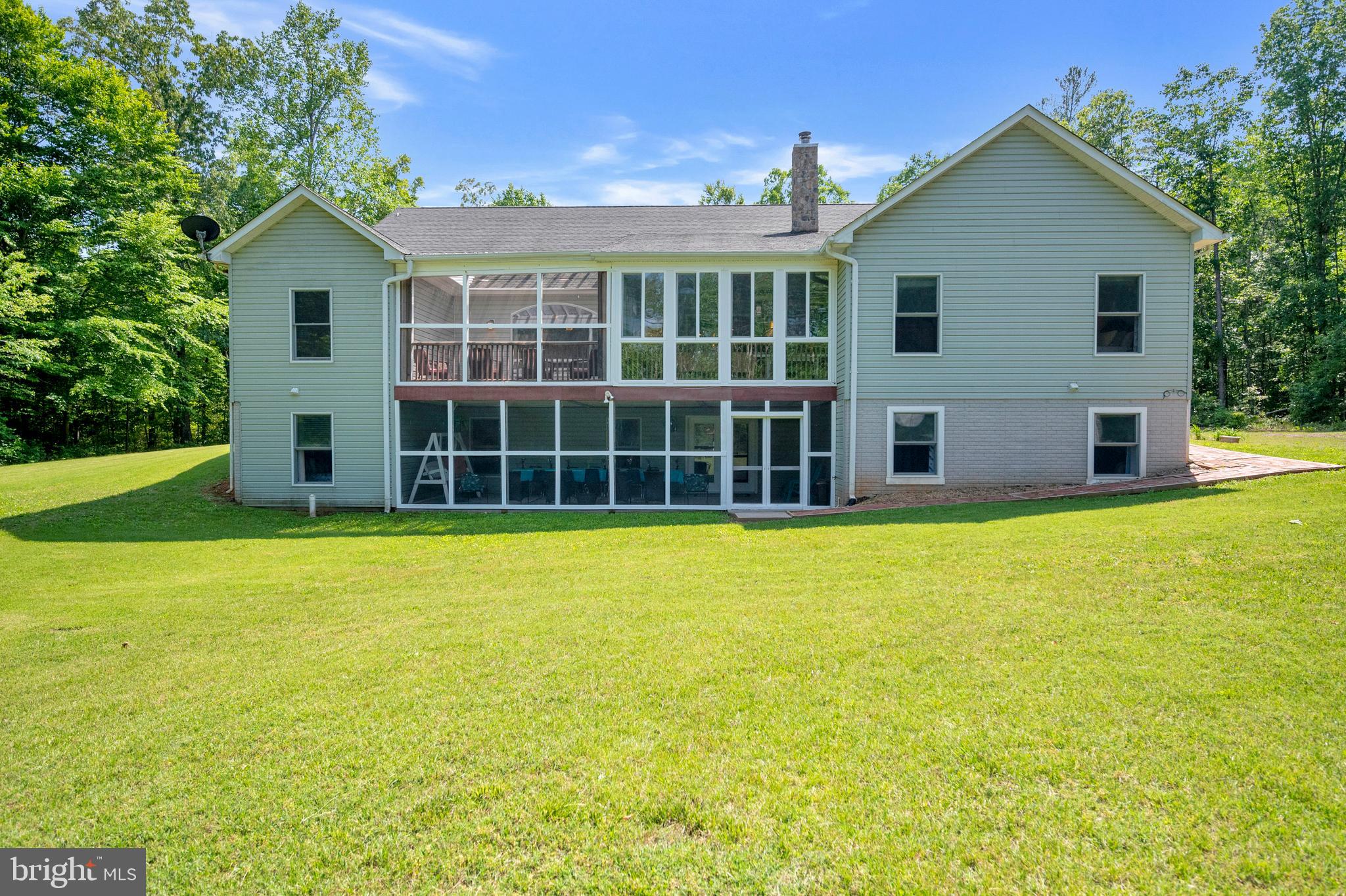 28229 Beech Drive Rhoadesville, VA 22542 - Photo 56 of 62 a view of a house with a garden and yard