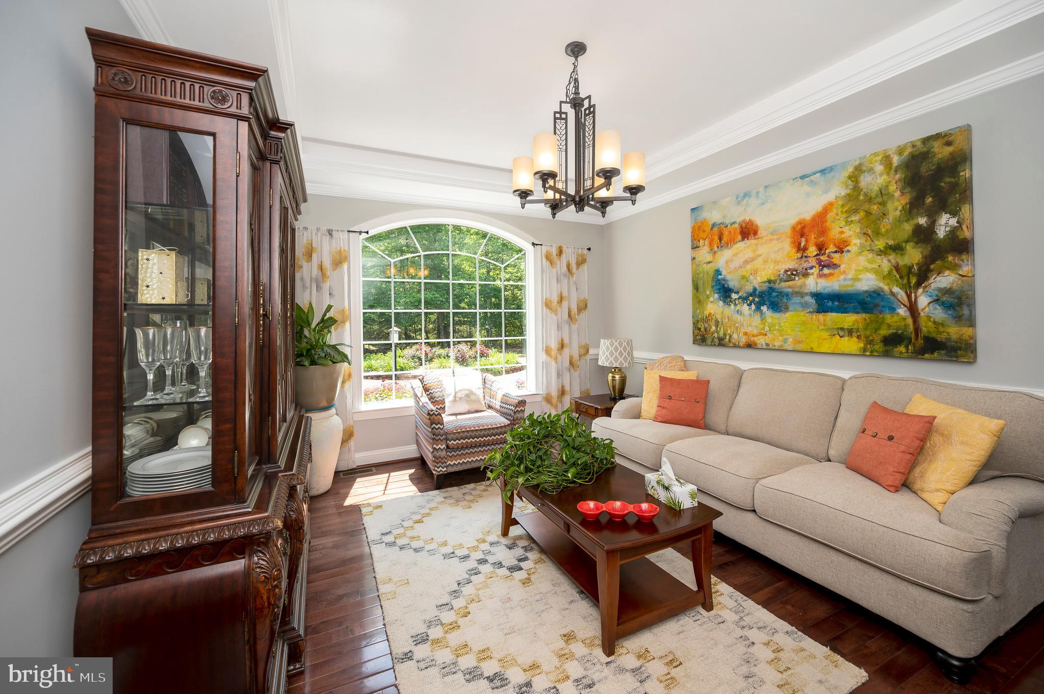 28229 Beech Drive Rhoadesville, VA 22542 - Photo 6 of 62 a living room with furniture and a chandelier