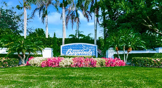 a view of a hallway with seating area