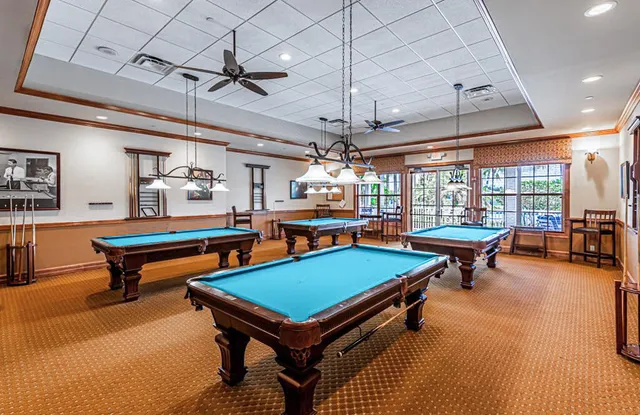 a living room with lots of furniture and a flat screen tv
