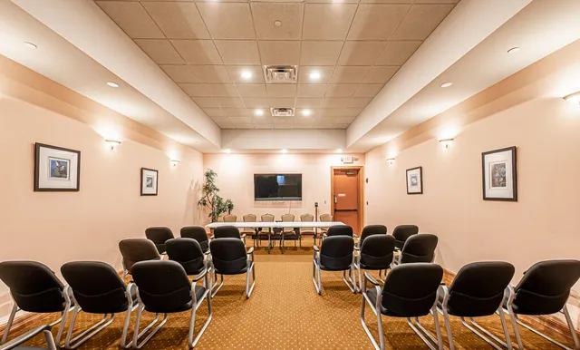 a swimming pool with outdoor seating and yard