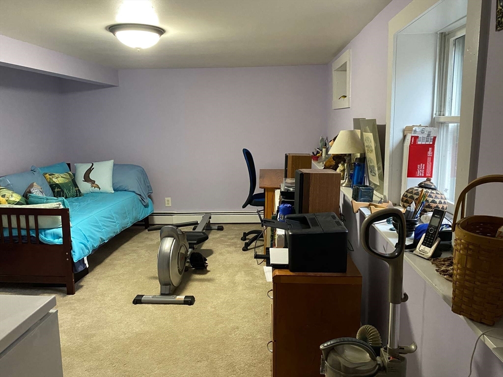 8 May Street Beverly, MA 01915 - Photo 20 of 25 a view of a room with gym equipment
