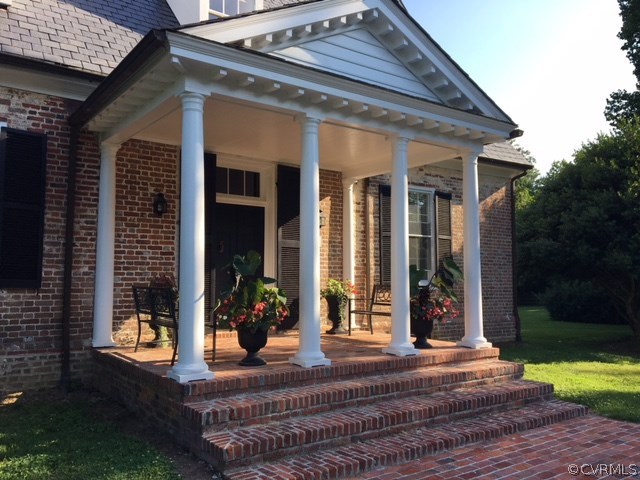 Covered front porch offers a great spot to take in