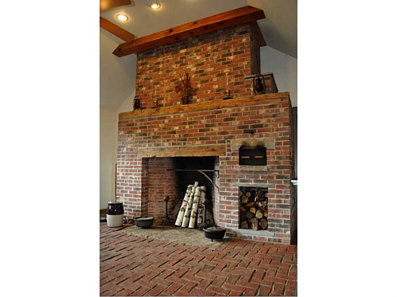135 Scott Hollow Road Coventry, RI 02816 - Photo 13 of 25 Kitchen. THE HEARTH AND SIDES OF THE OVEN ARE MADE OF SOAPSTONE TO TAKE ADVANTAGE OF HEAT RETENTION.