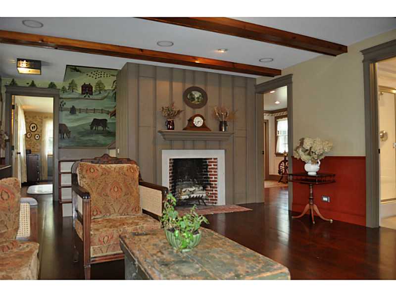 135 Scott Hollow Road Coventry, RI 02816 - Photo 6 of 25 Den/Family/Great Room. THE LIVING ROOM HAS PINE BOARD WAINSCOTING AND A 36 INCH RUMFORD FIREPLACE