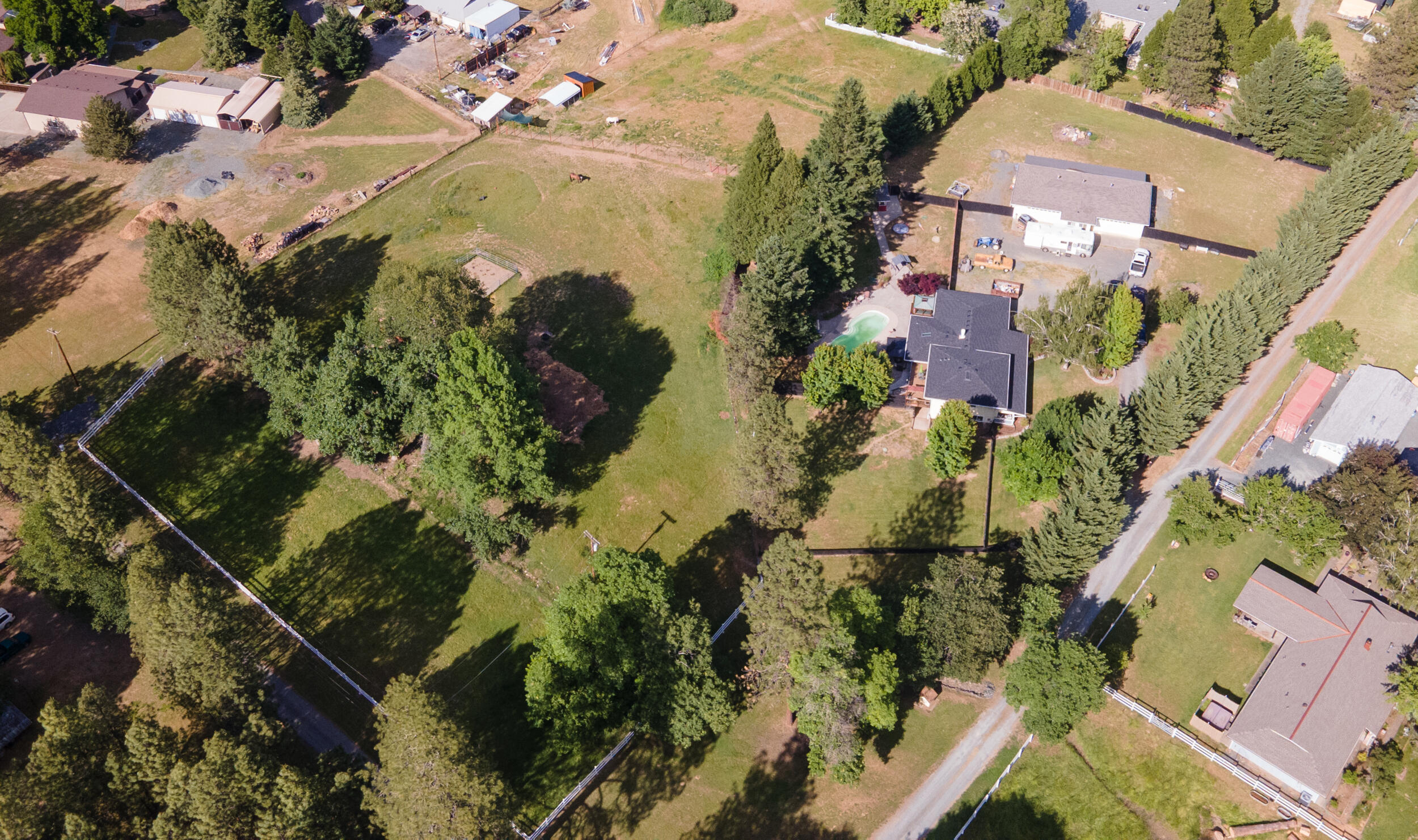 255 Queens Branch Road Rogue River, OR 97537 - Photo 59 of 60 an aerial view of residential houses with outdoor space