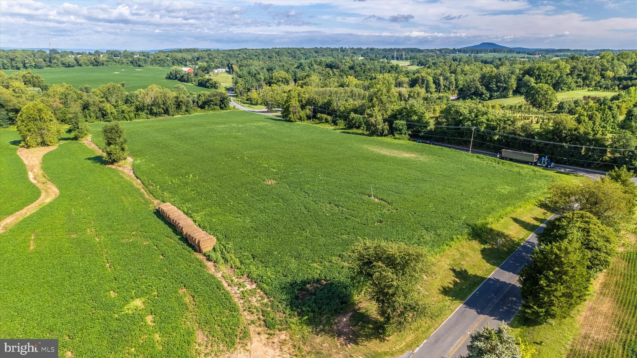 19101 Darnestown Road Poolesville, MD 20837 - Photo 14 of 27 a view of a lush green field