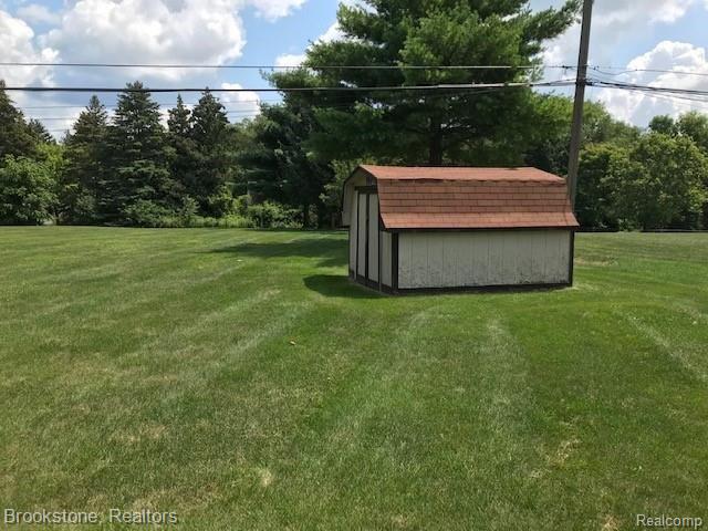 6940 Walters Road Clarkston, MI 48346 - Photo 27 of 37 Back yard shed.jpg