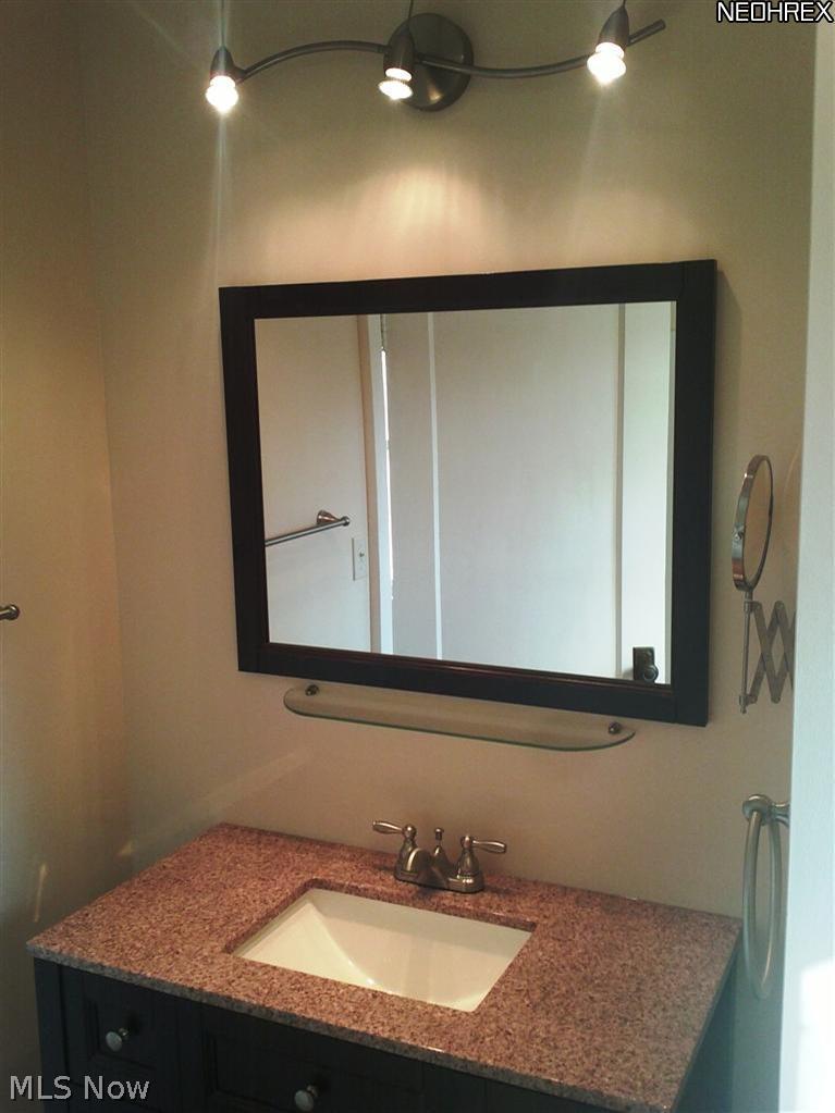 3642 Bainbridge Road Cleveland Heights, OH 44118 - Photo 17 of 25 Tredy large bath w custom sink, new tub surround & comode
