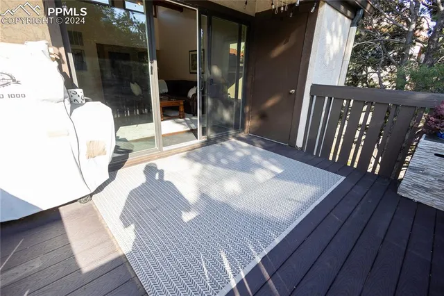 a view of a house with a tree