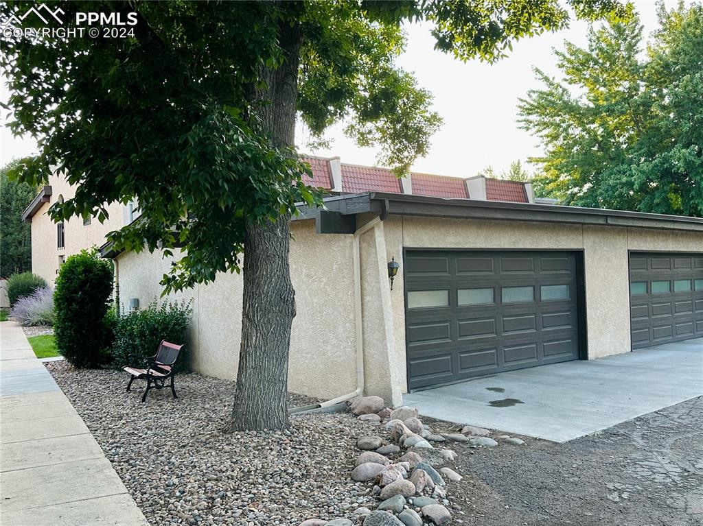 3123 Broadmoor Valley Road, Unit D Colorado Springs, CO 80906 - Photo 32 of 38 a view of a house with a outdoor space