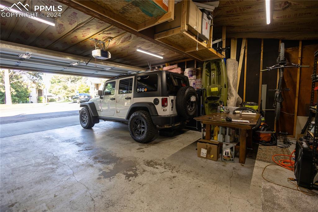3123 Broadmoor Valley Road, Unit D Colorado Springs, CO 80906 - Photo 36 of 38 a view of car garage