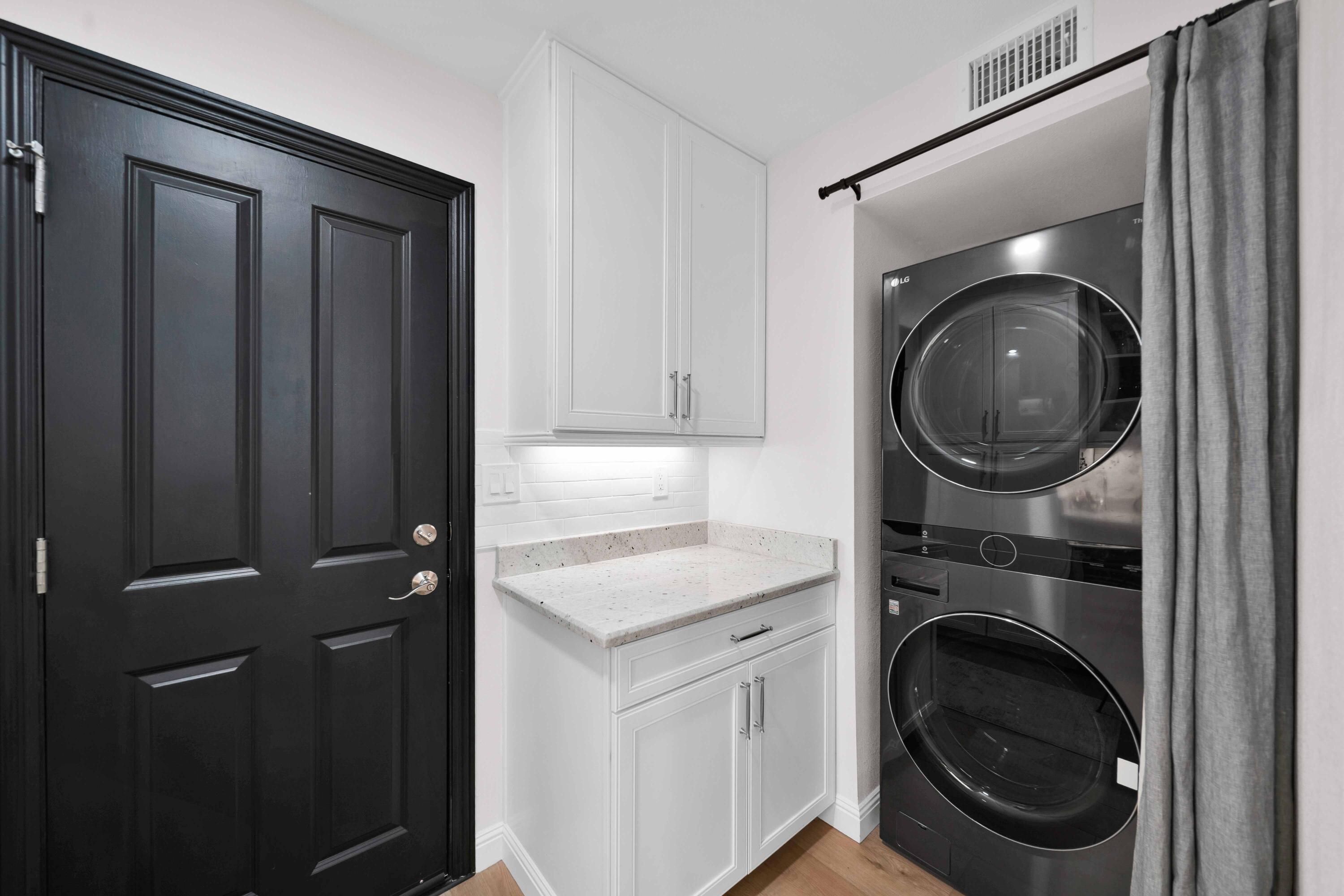 1928 Bechelli Lane Redding, CA 96002 - Photo 17 of 67 a utility room with dryer and washer
