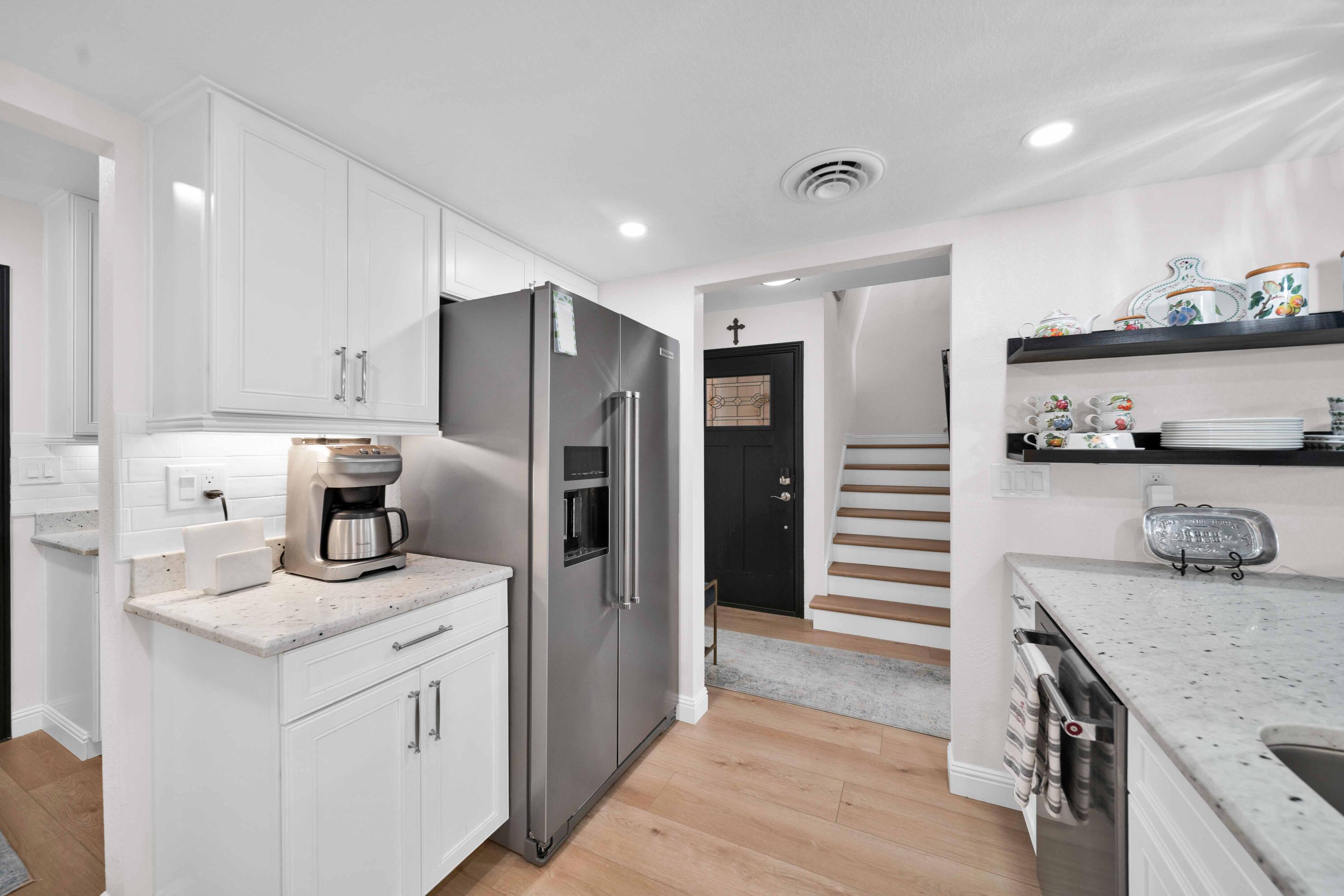 1928 Bechelli Lane Redding, CA 96002 - Photo 19 of 67 View of Stairway from Far End of Kitchen