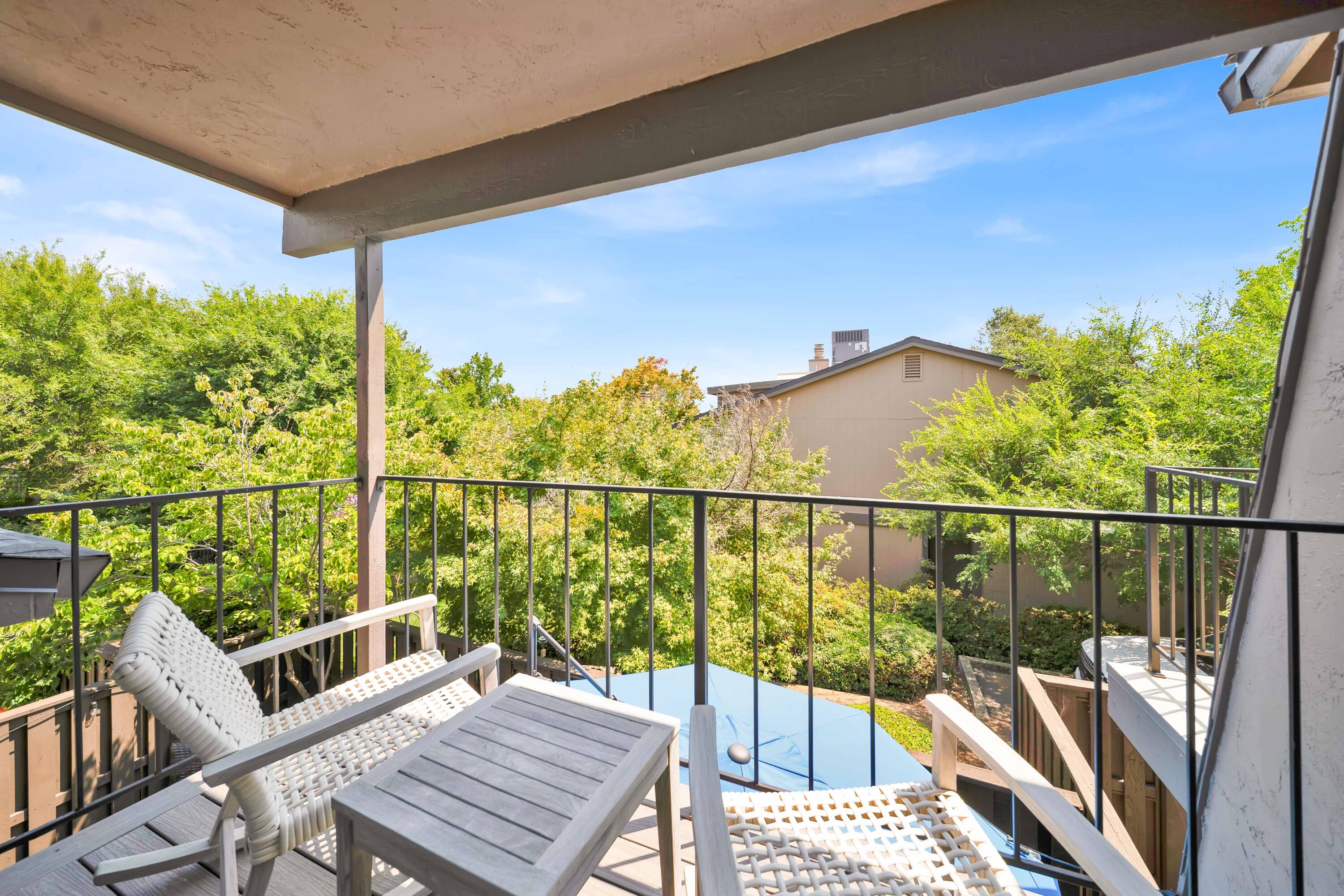1928 Bechelli Lane Redding, CA 96002 - Photo 29 of 67 a view of a balcony with wooden floor & fence