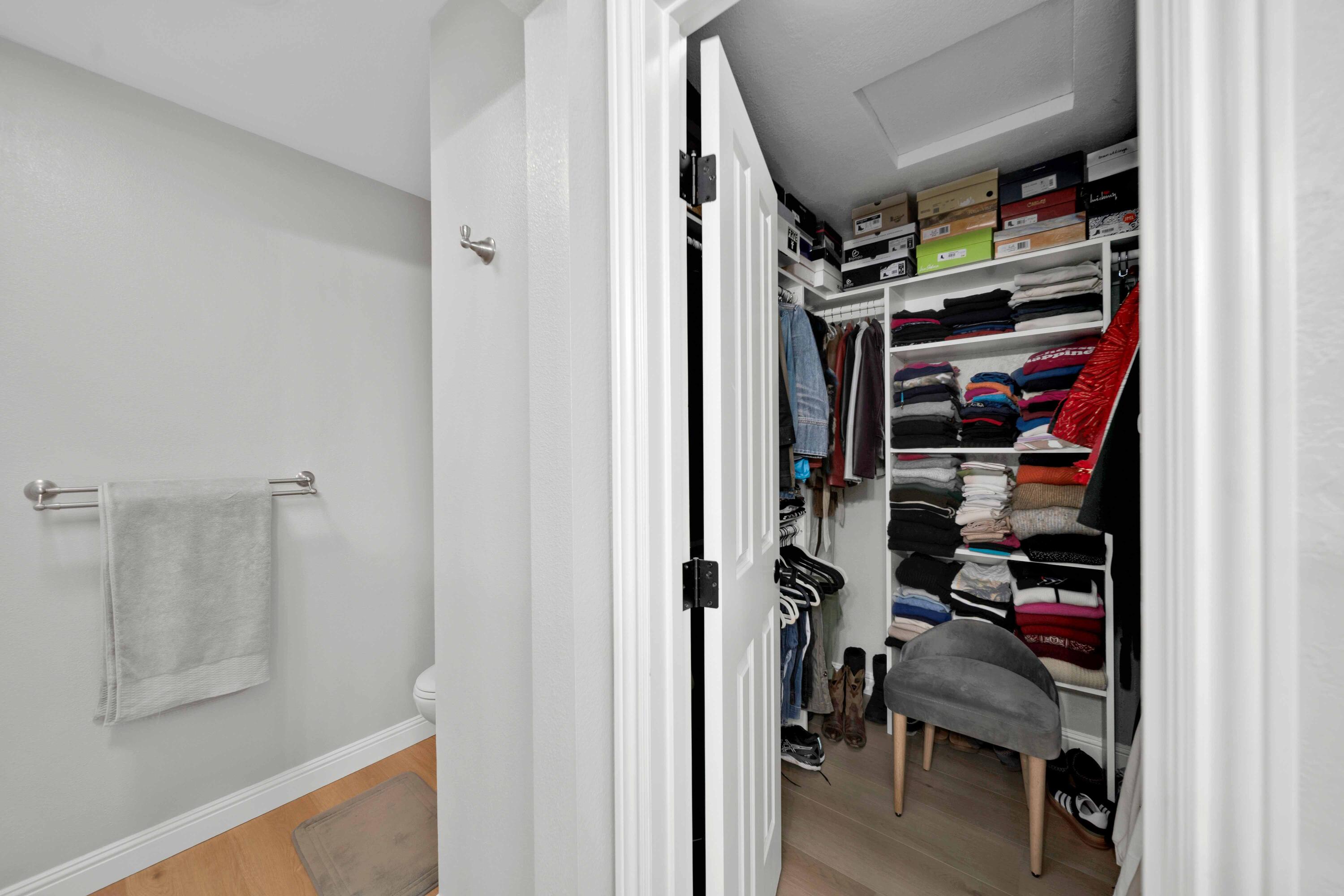 1928 Bechelli Lane Redding, CA 96002 - Photo 35 of 67 a view of walk in closet with clothes and shoes