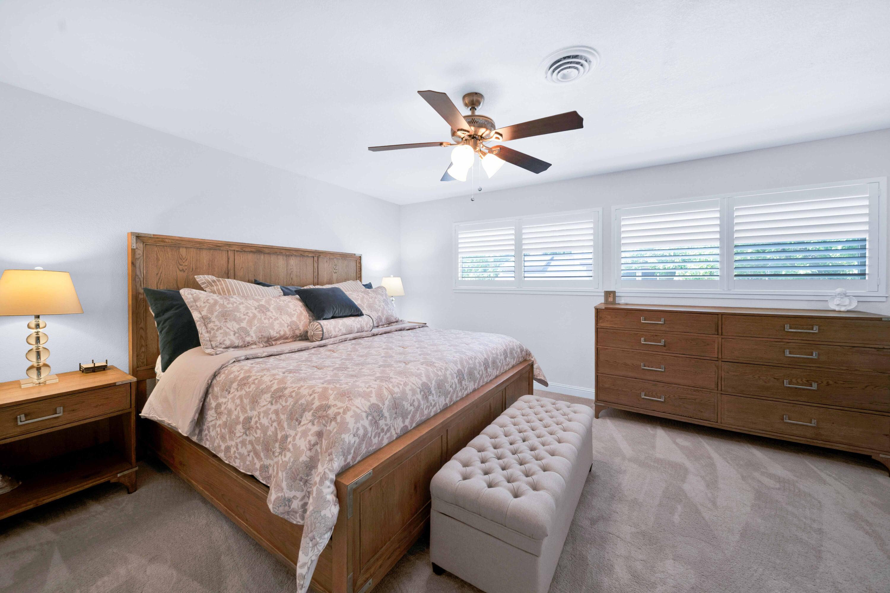 1928 Bechelli Lane Redding, CA 96002 - Photo 36 of 67 a bedroom with a bed and a window