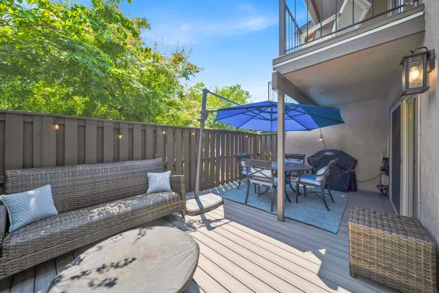 a view of swimming pool with outdoor seating and yard in back
