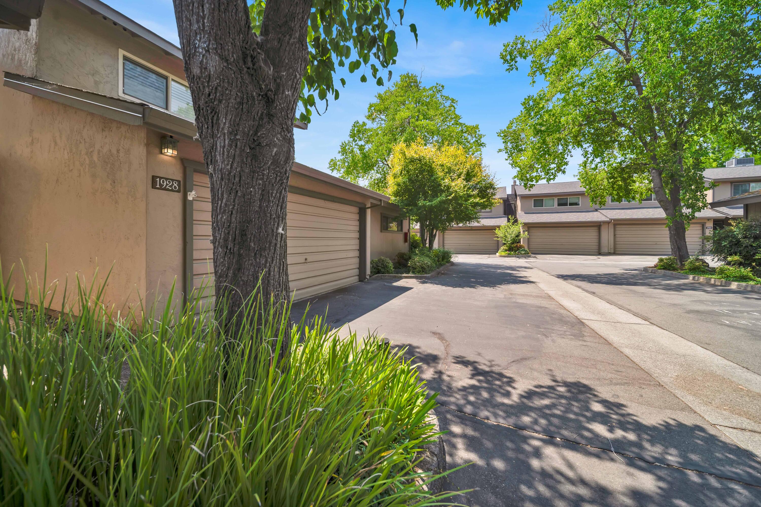 1928 Bechelli Lane Redding, CA 96002 - Photo 50 of 67 a white house that has a tree in front of it