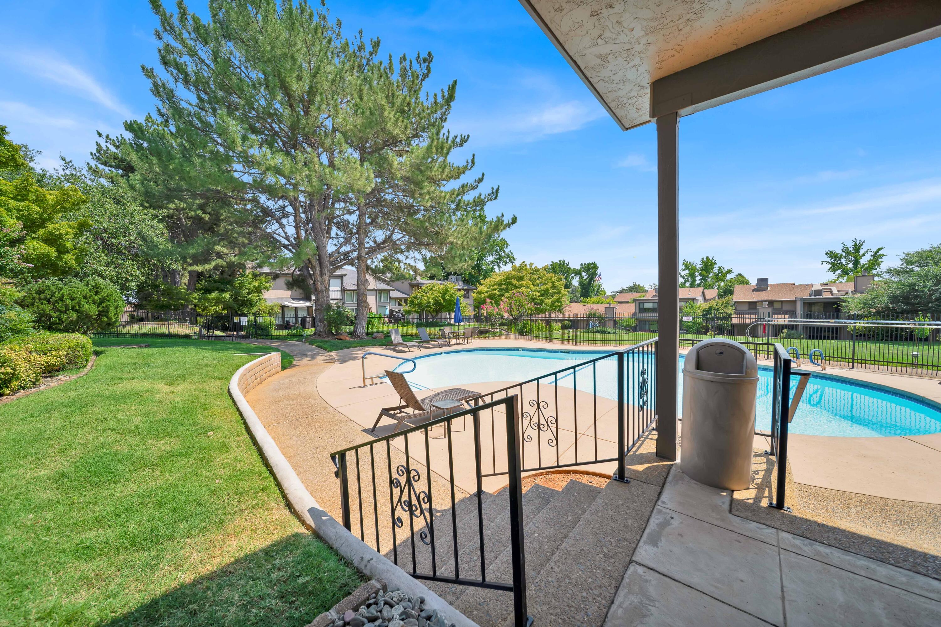 1928 Bechelli Lane Redding, CA 96002 - Photo 54 of 67 a view of a couches in a backyard with a small yard