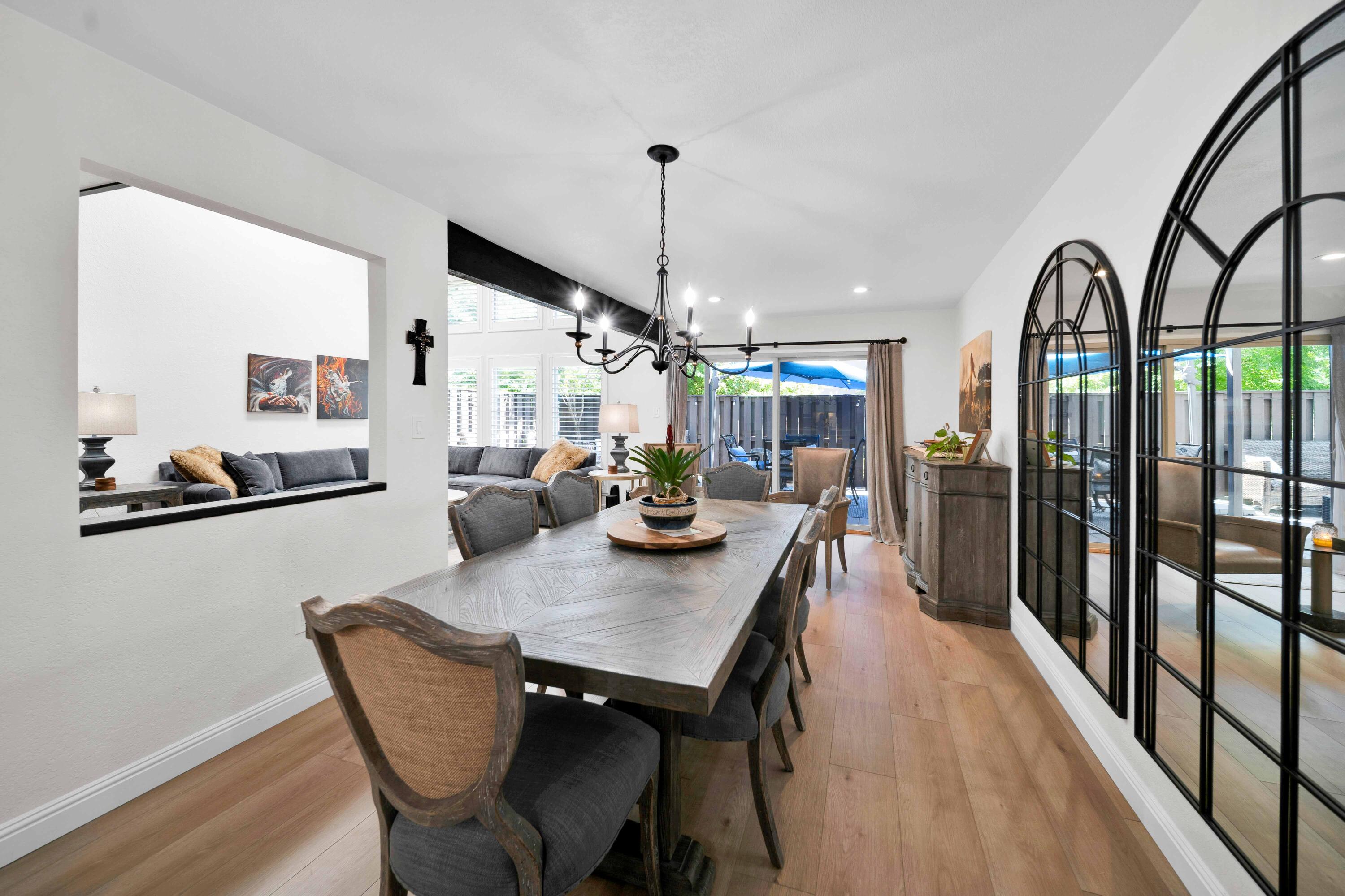1928 Bechelli Lane Redding, CA 96002 - Photo 6 of 67 a view of a dining room with furniture window and wooden floor