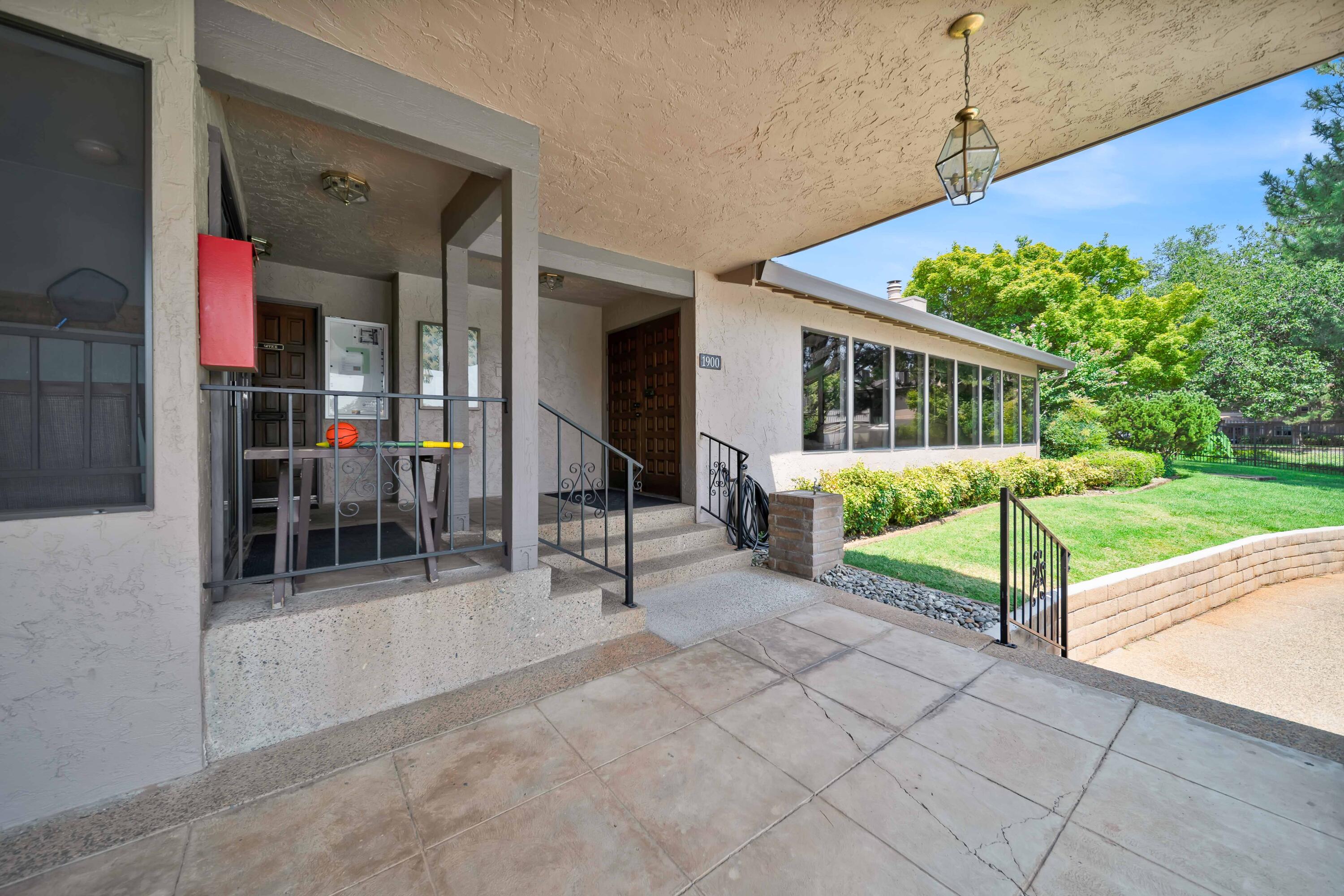 1928 Bechelli Lane Redding, CA 96002 - Photo 63 of 67 a view of a house with a porch and furniture