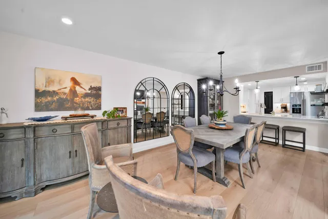 a living room with fireplace furniture and a flat screen tv