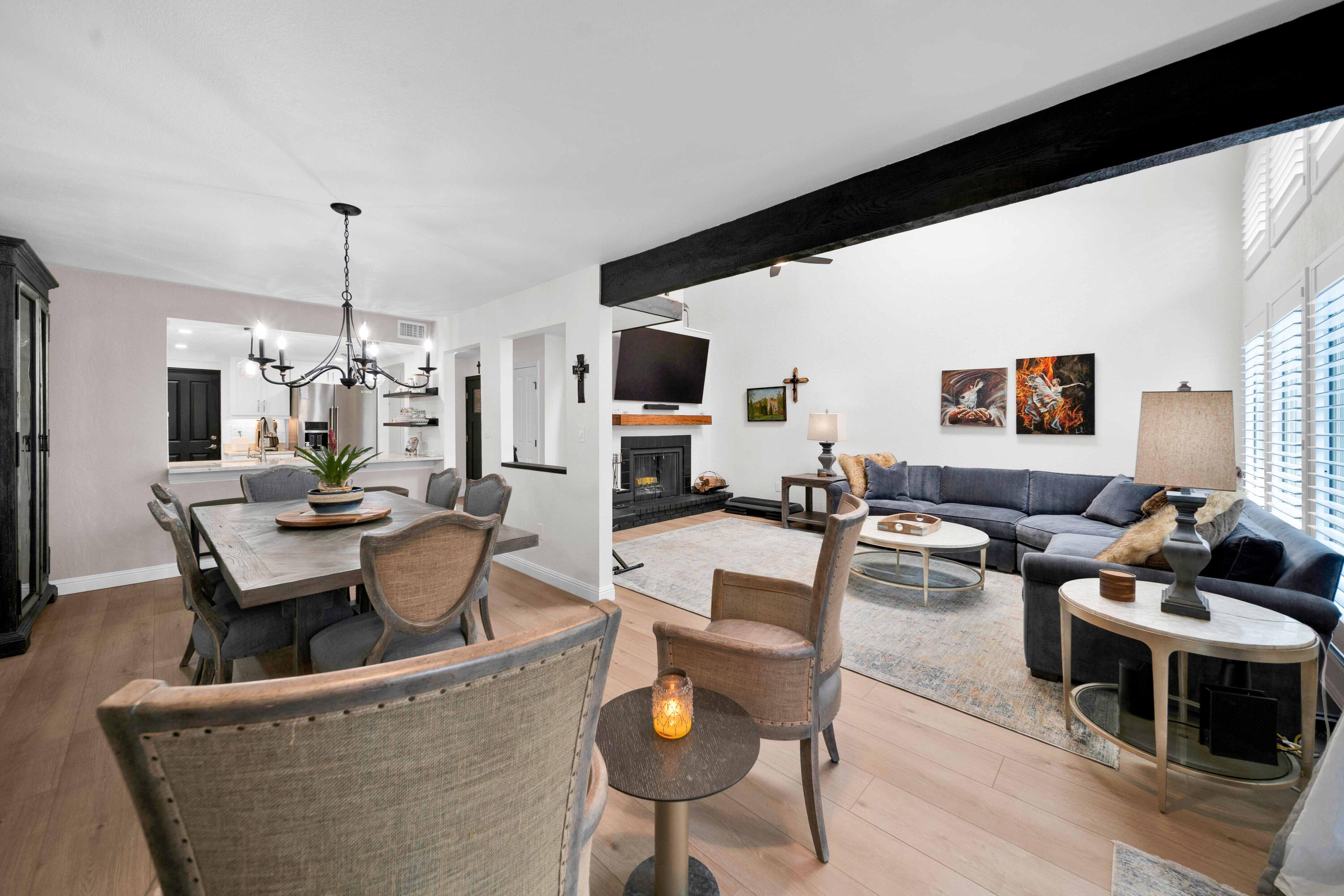 1928 Bechelli Lane Redding, CA 96002 - Photo 9 of 67 a living room with fireplace furniture and a flat screen tv