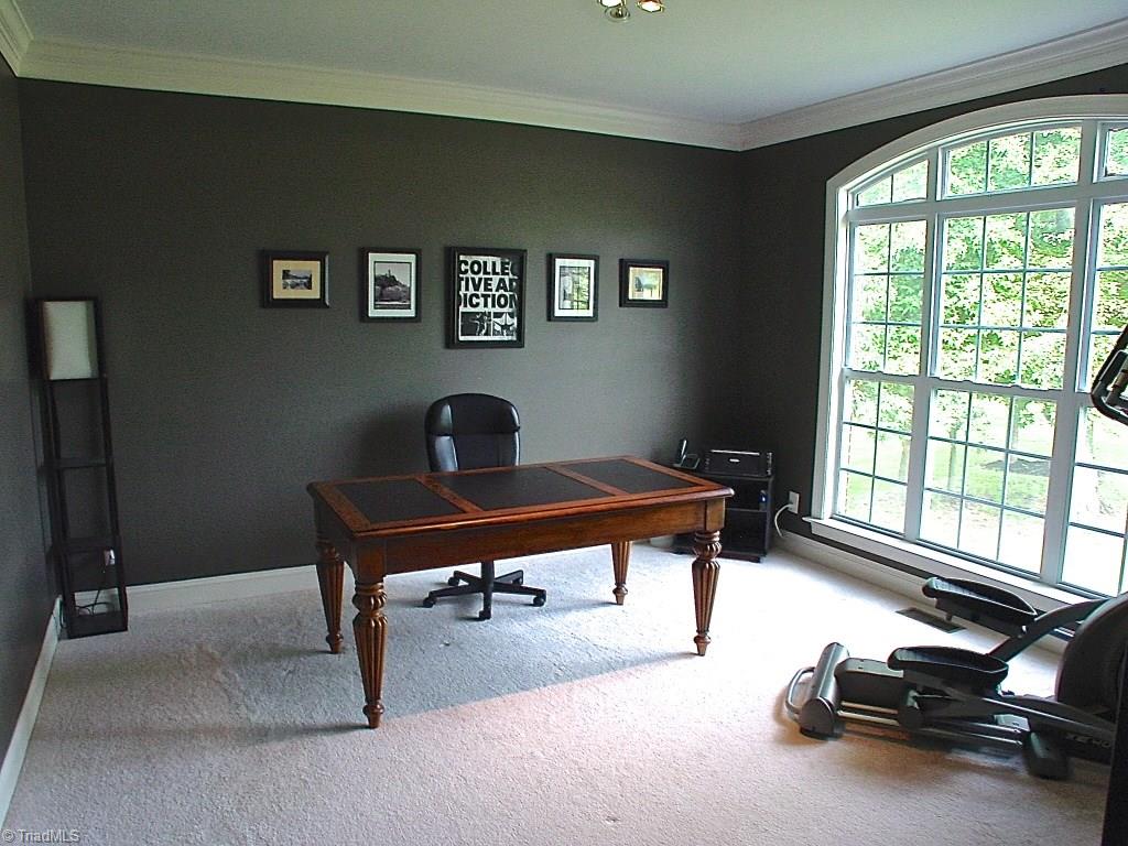 711 Number Ten Way Oak Ridge, NC 27310 - Photo 11 of 25 Great room for an office, library/reading room or even workout room. Big bright Arched top window.