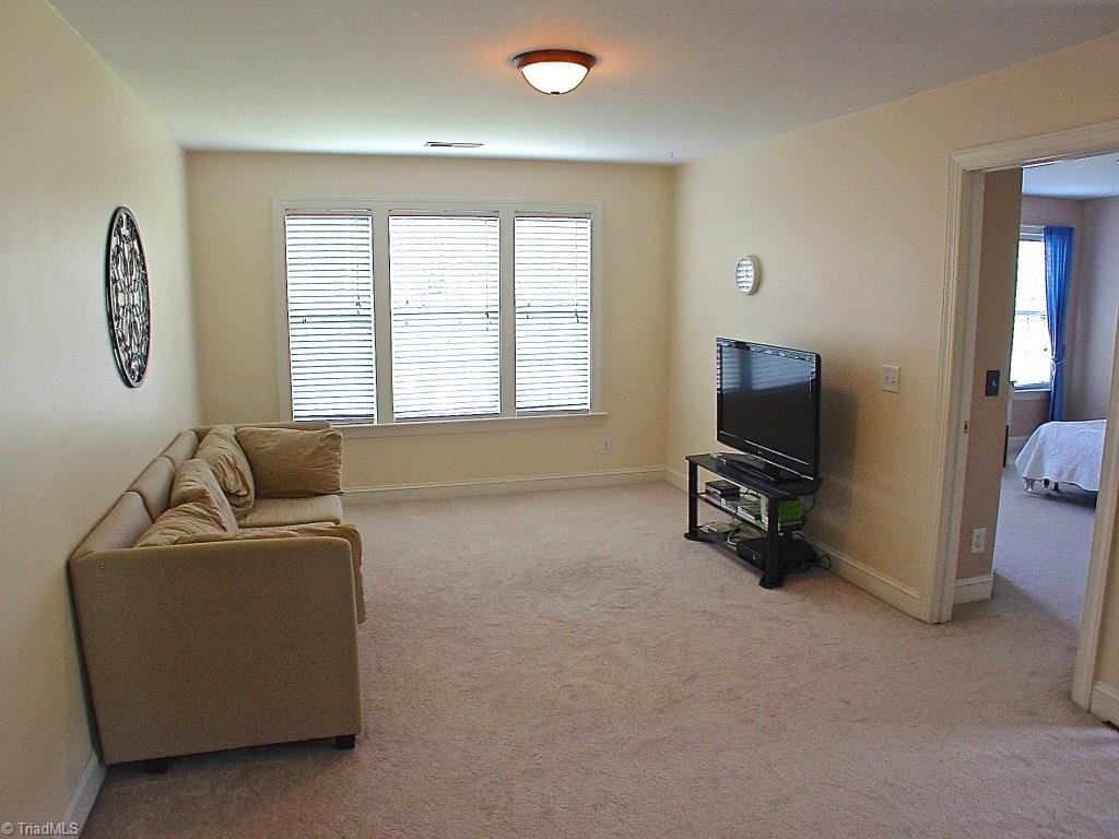 711 Number Ten Way Oak Ridge, NC 27310 - Photo 14 of 25 Nice loft area with great space for gaming and tv