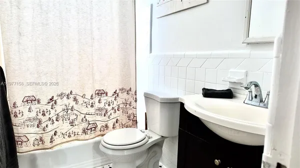 a view of a car parked in front of a building